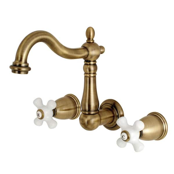 Kingston Brass Heritage 2-Handle Wall Mount Bathroom Faucet in Antique Brass