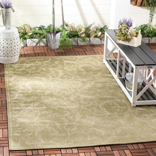 Courtyard Olive/Natural 5 ft. x 8 ft. Border Indoor/Outdoor Patio  Area Rug