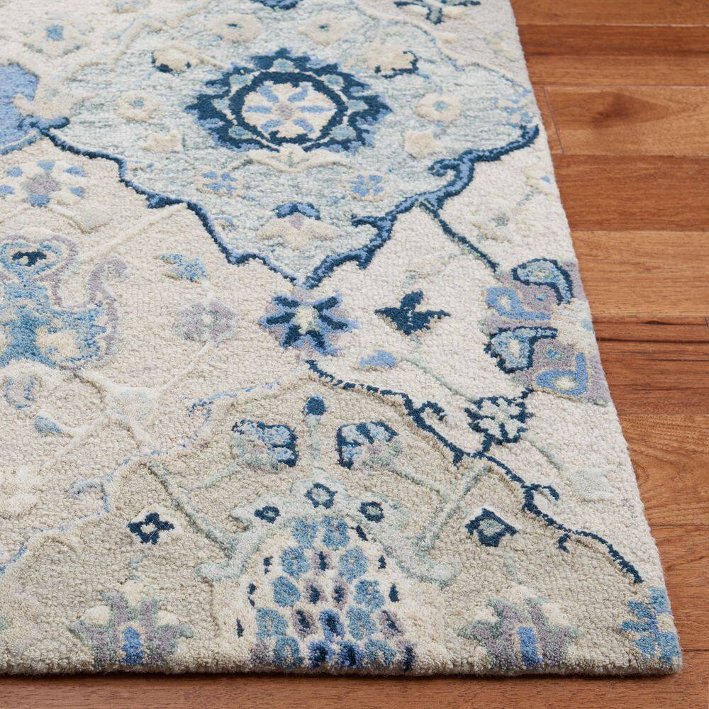 Beige and Blue 9' x 12' Hand-Tufted Wool Area Rug