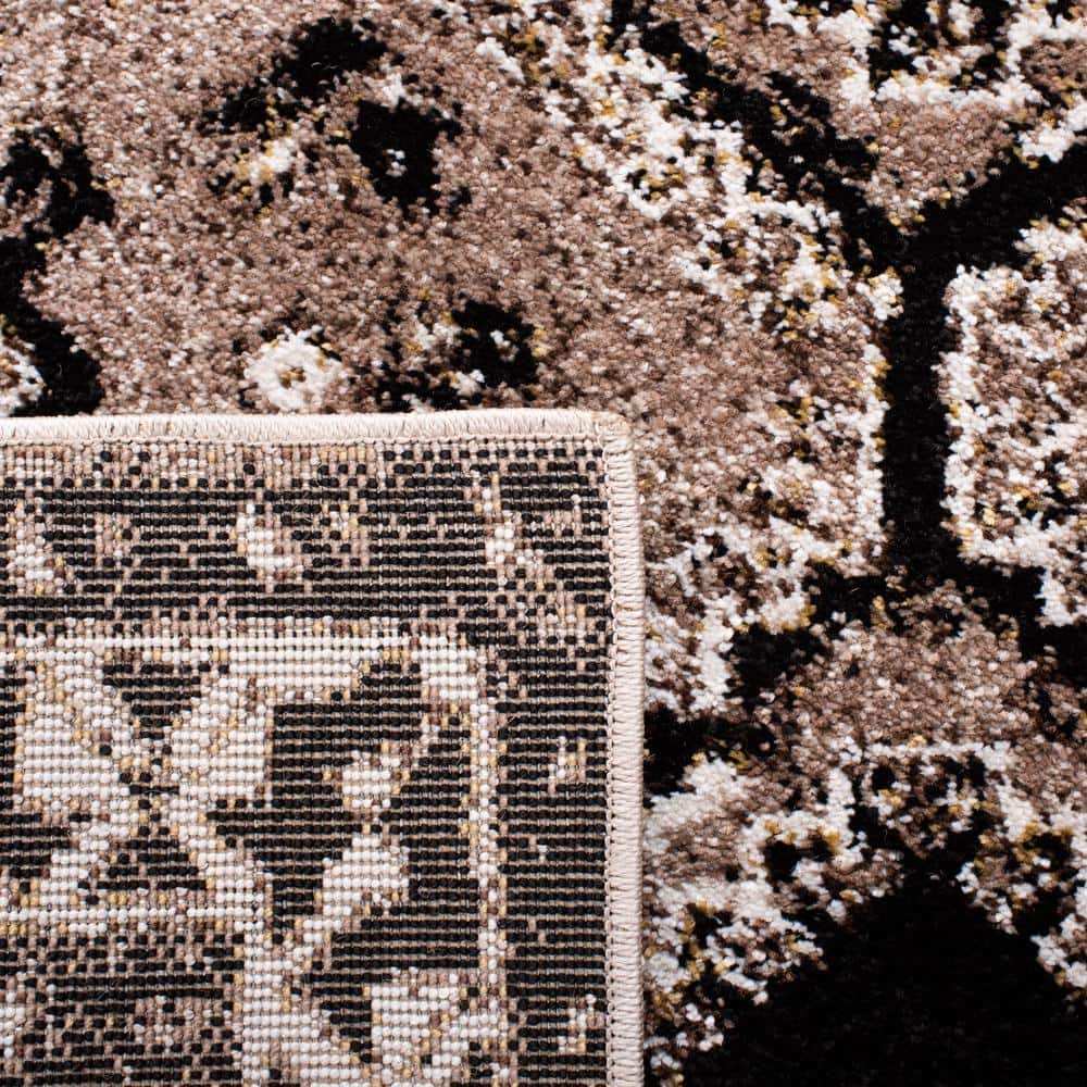 https://images.thdstatic.com/productImages/2a0962dd-3a4f-43ed-aa61-811225f2bd10/svn/brown-black-safavieh-area-rugs-vth293t-28-44_1000.jpg