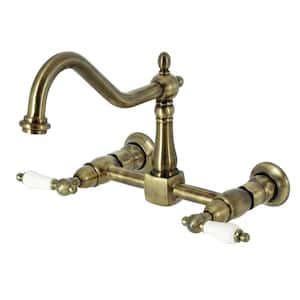 Heritage 2-Handle Wall Mount Kitchen Faucets in Antique Brass