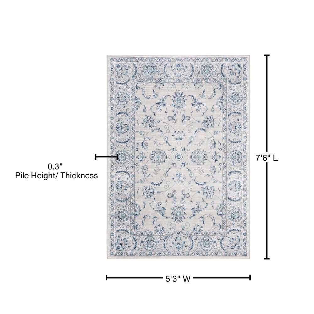 Brentwood 5'3" x 7'6" Blue Synthetic Stain-Resistant Area Rug