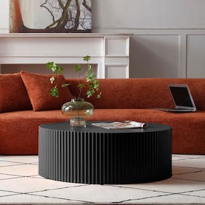 Sleek and Modern Round Coffee Table with Eye-Catching Relief Design, Black