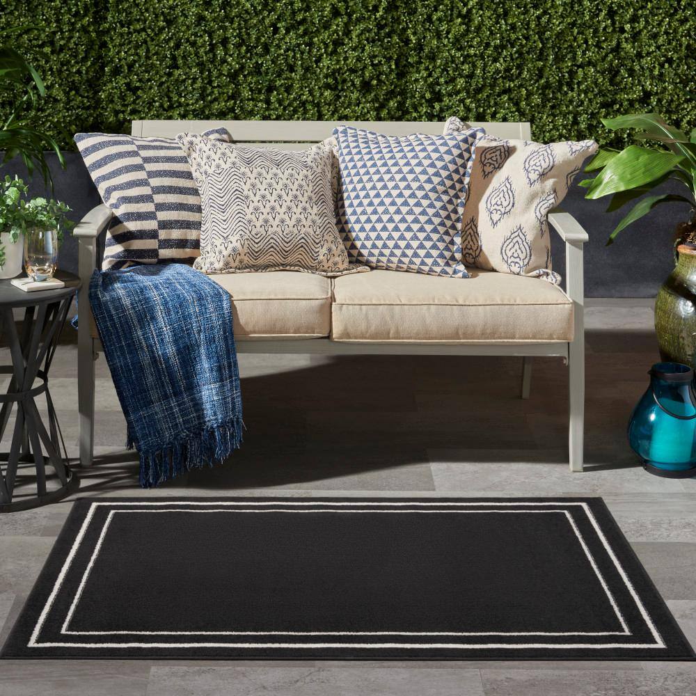 Black Ivory 2' x 4' Synthetic Indoor Outdoor Area Rug