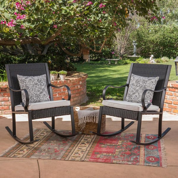 Noble House Harmony Black Faux Rattan Outdoor Rocking Chairs with White Cushions (2-Pack)