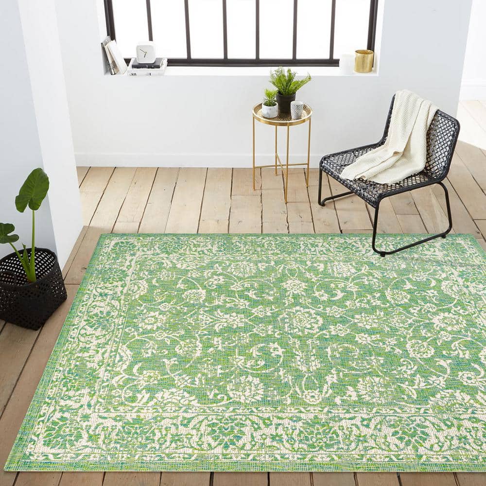 9' x 12' Green and Cream Floral Synthetic Rectangular Area Rug