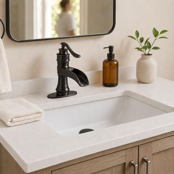 Waterfall Single Hole Single-Handle Low-Arc Bathroom Faucet with Pop Up Drain Assembly in Oil Rubbed Bronze
