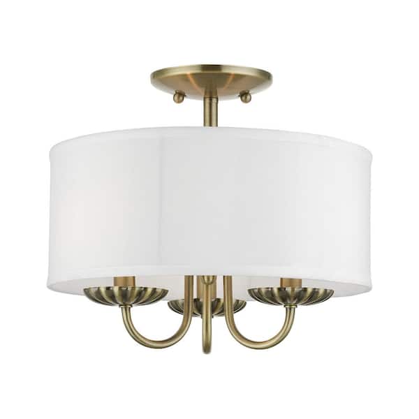 AVIANCE LIGHTING Dunnhaven 13 in. 3-Light Antique Brass Semi Flush Mount with Off-White Fabric Shade