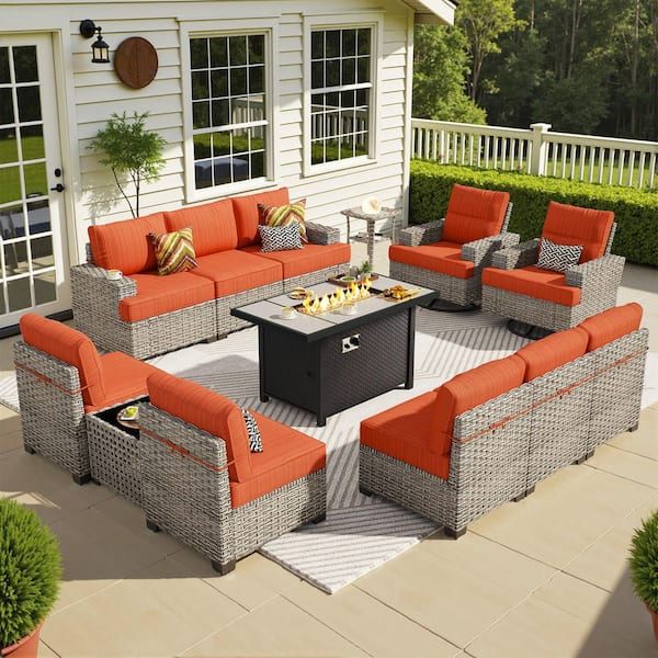 Butterfly 13 Pieces Wicker Outdoor Patio Rectangular Fire Pit Set and Swivel Rocking Chairs with Orange Red Cushions