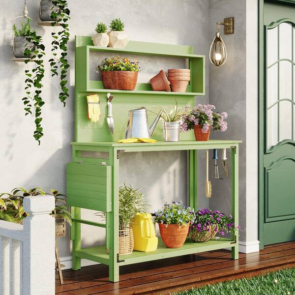 https://images.thdstatic.com/productImages/2ab38401-474d-4ac2-bf1e-0e267afee966/svn/green-potting-benches-and-tables-zbwwf297928aaf-fa_600.jpg