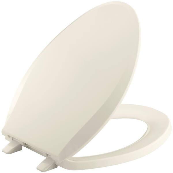 KOHLER Cachet Elongated, Closed-Front Toilet Seat with Q2 Advantage in Almond