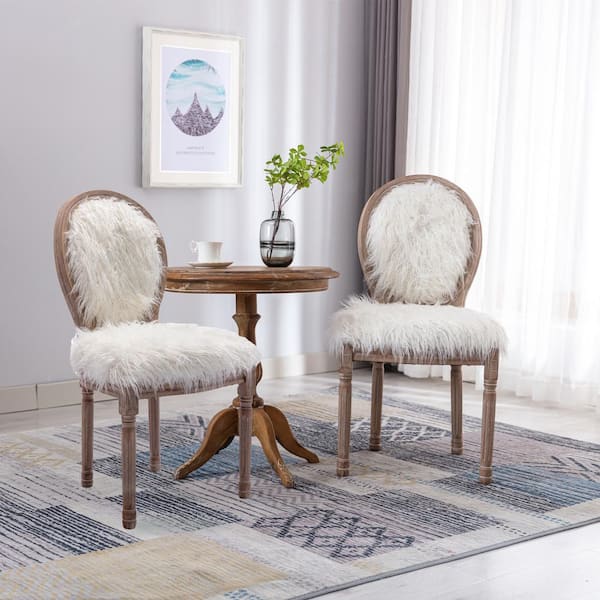 https://images.thdstatic.com/productImages/2abff83d-5aef-4596-a0ac-dc5d72af574c/svn/white-mieres-dining-chairs-wyzw212388221-31_600.jpg