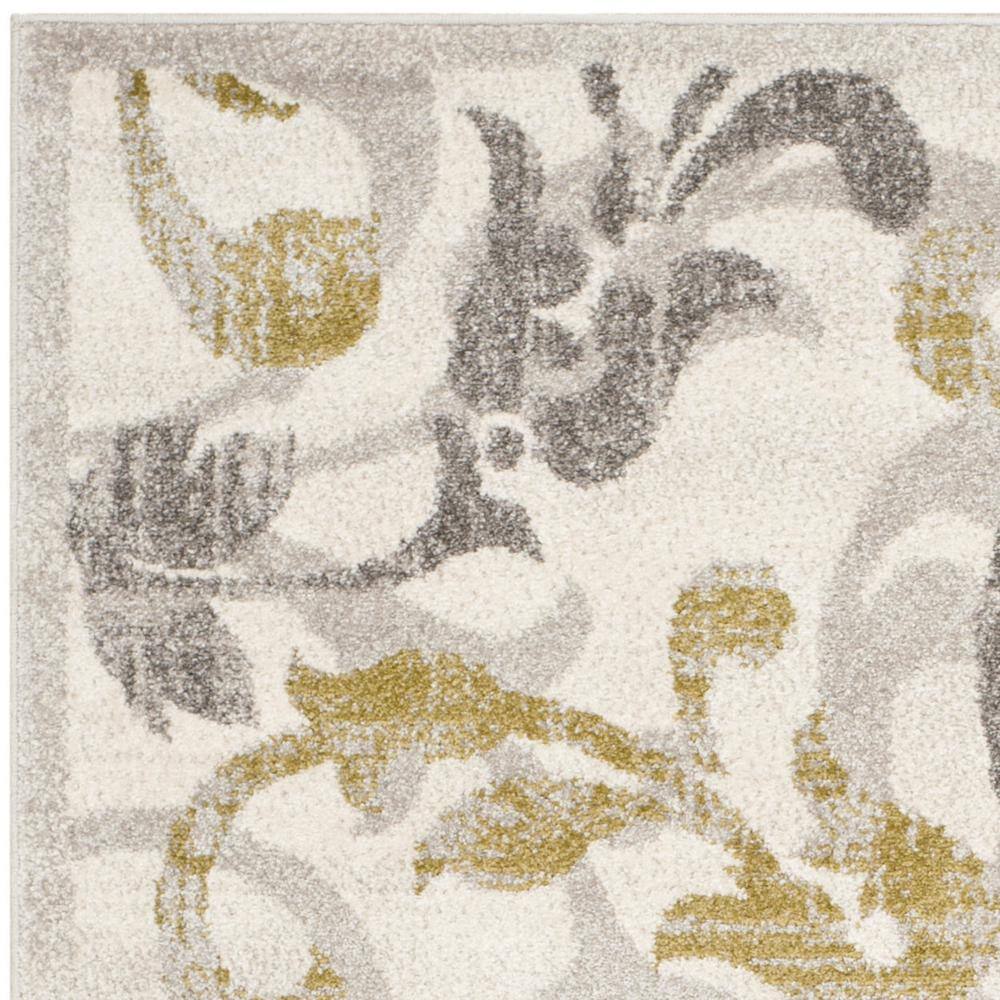 Ivory and Light Grey Floral Synthetic Area Rug
