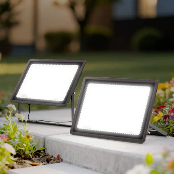 300W Black Plug-in Outdoor 7024 Lumen Integrated LED Flood Light with 9. 8FT Cord, IP66 Waterproof Dusk to Dawn Light