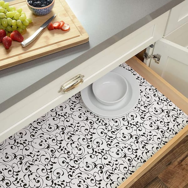 https://images.thdstatic.com/productImages/2ae2776f-5b43-47f4-924e-ac2a3bb0b332/svn/black-and-white-floral-con-tact-shelf-liners-drawer-liners-08f-c8ar6-04-1f_600.jpg