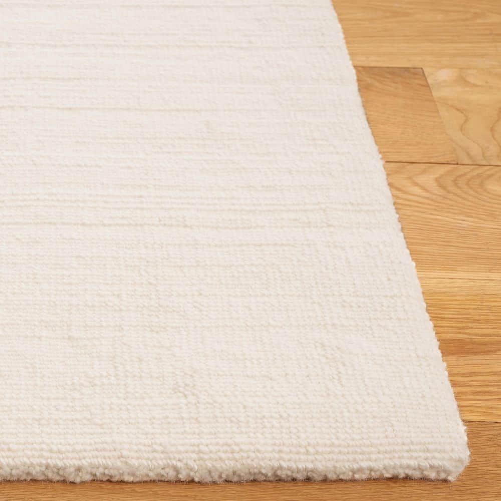 Mirage 8 ft. x 10 ft. Ivory Modern Solid Area Rug - thumbnail 3