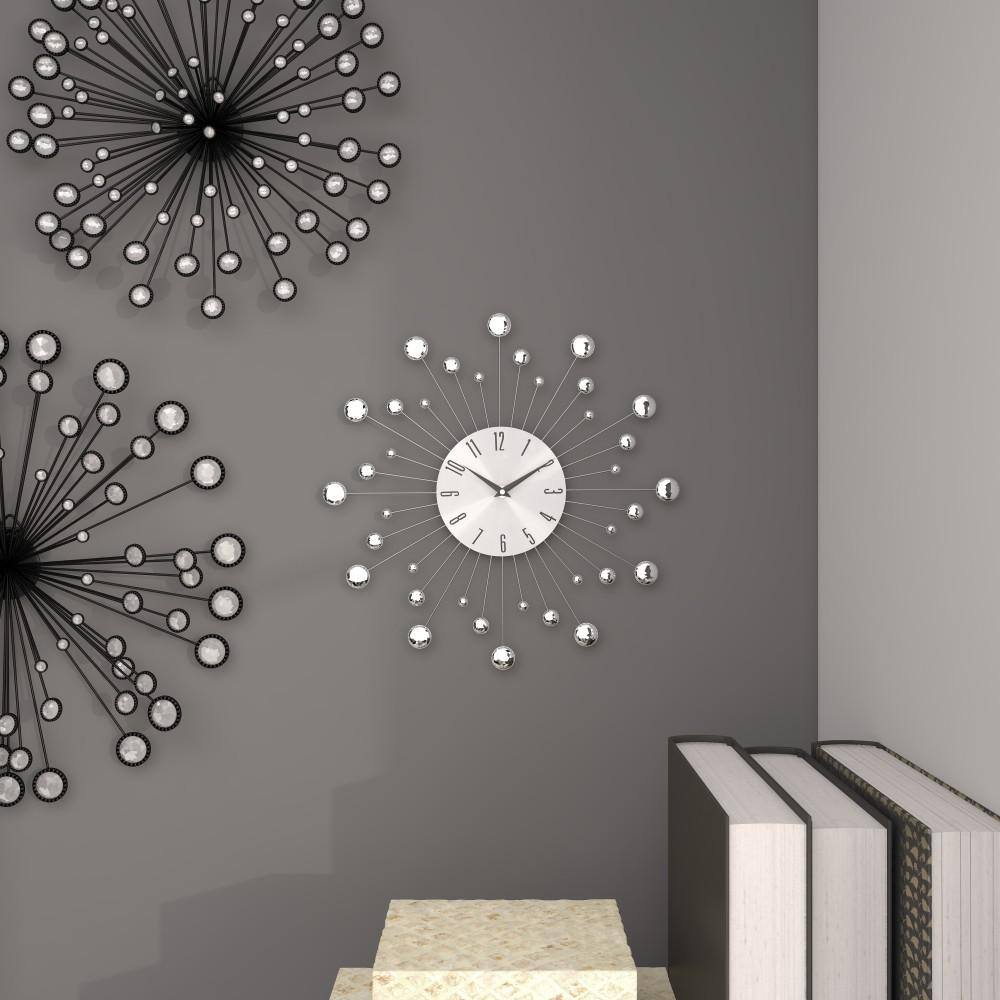 Silver Metal Starburst Wall Clock with Crystal Accents