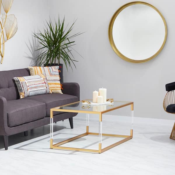 Litton Lane 46 in. Gold Medium Rectangle Metal Coffee Table with Clear Glass Top and Acrylic Legs