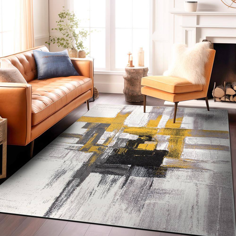 Contemporary Abstract Gold and Gray Synthetic 6'6" x 9' Area Rug