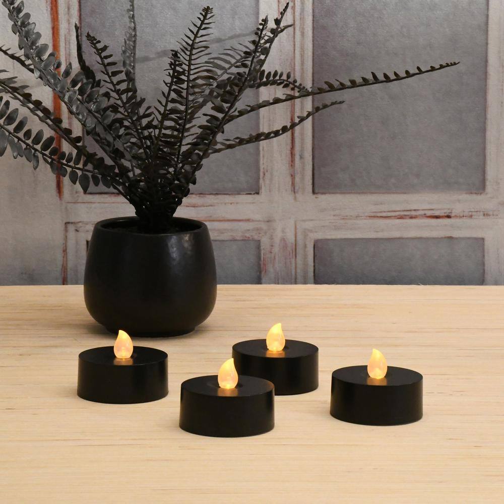 Set of Four Black LED Flameless Tealight Candles with Remote