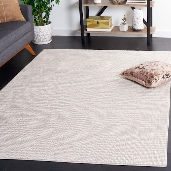 Continental 7 ft. x 9 ft. Ivory/Beige Uniform Geometric Area Rug
