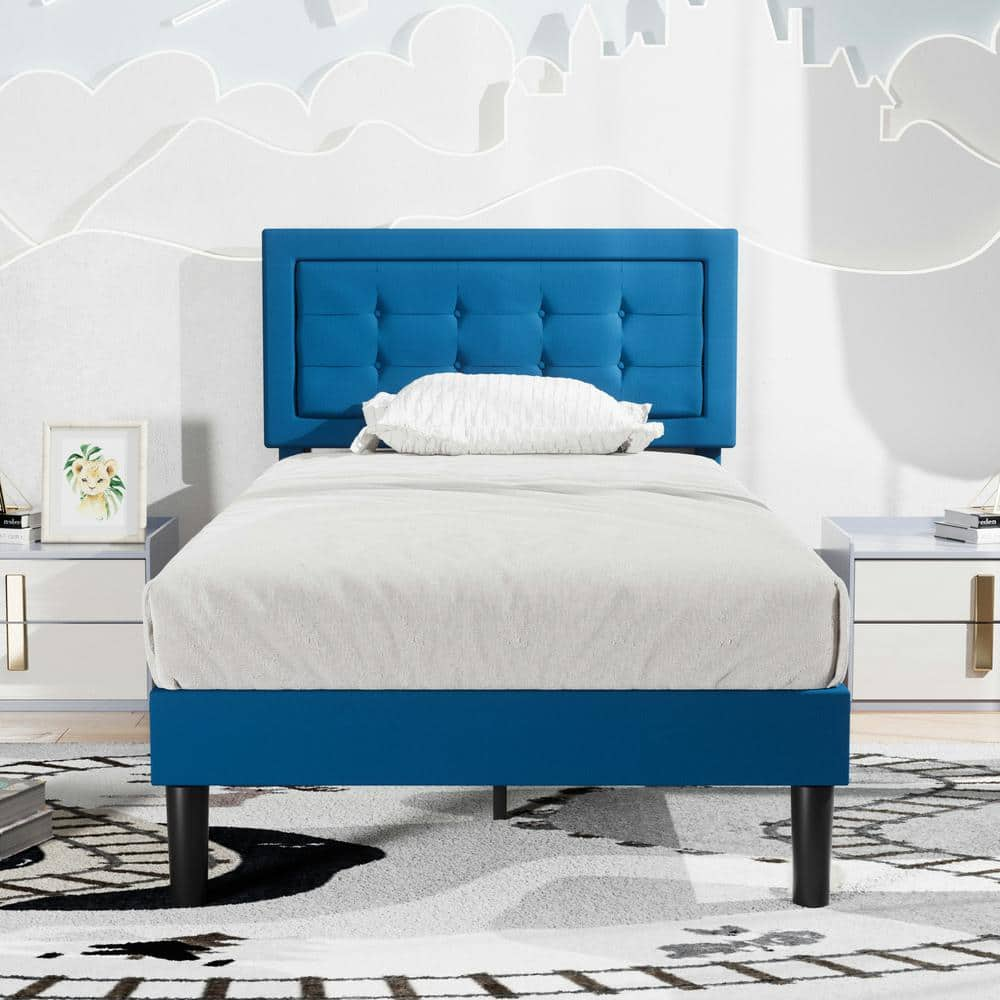 Blue upholstered online twin bed