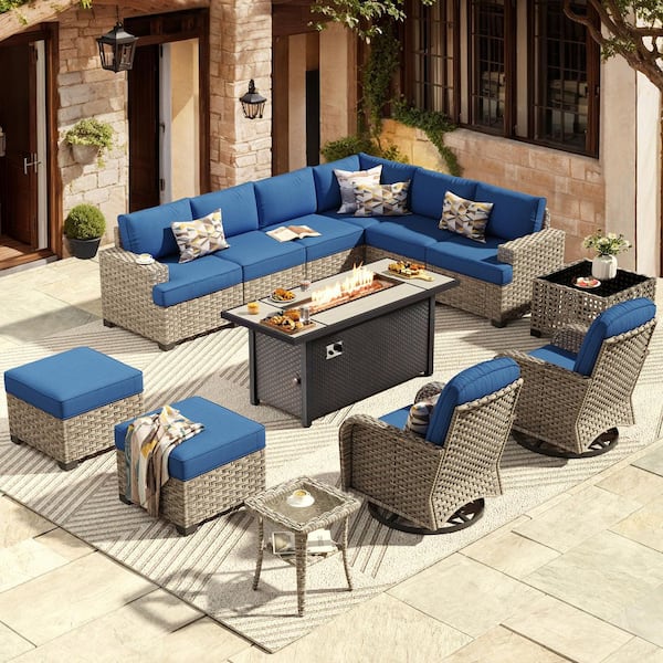XIZZI Eternity 13 Pieces Wicker Outdoor Patio Rectangular Fire Pit Set and Swivel Rocking Chairs with Navy Blue Cushions