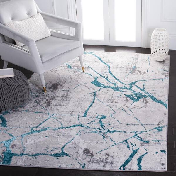 https://images.thdstatic.com/productImages/2b38895d-fc45-4dea-918d-4b8d56d22221/svn/gray-aqua-safavieh-area-rugs-ala293h-4-e1_600.jpg