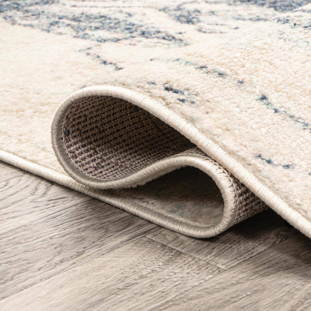 Blue and Cream Abstract 8' x 10' Synthetic Area Rug