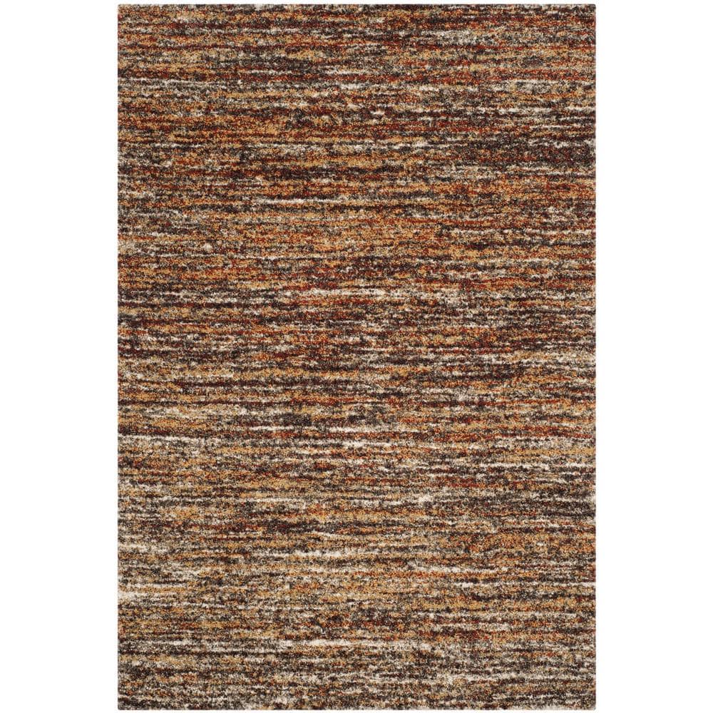 Ivory and Gold Abstract Shag Synthetic Area Rug 4' x 6'