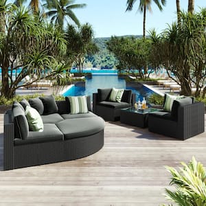 Gray 7-Piece Wicker Outdoor Sectional Set with Striped Green Pillows and Gray Cushions