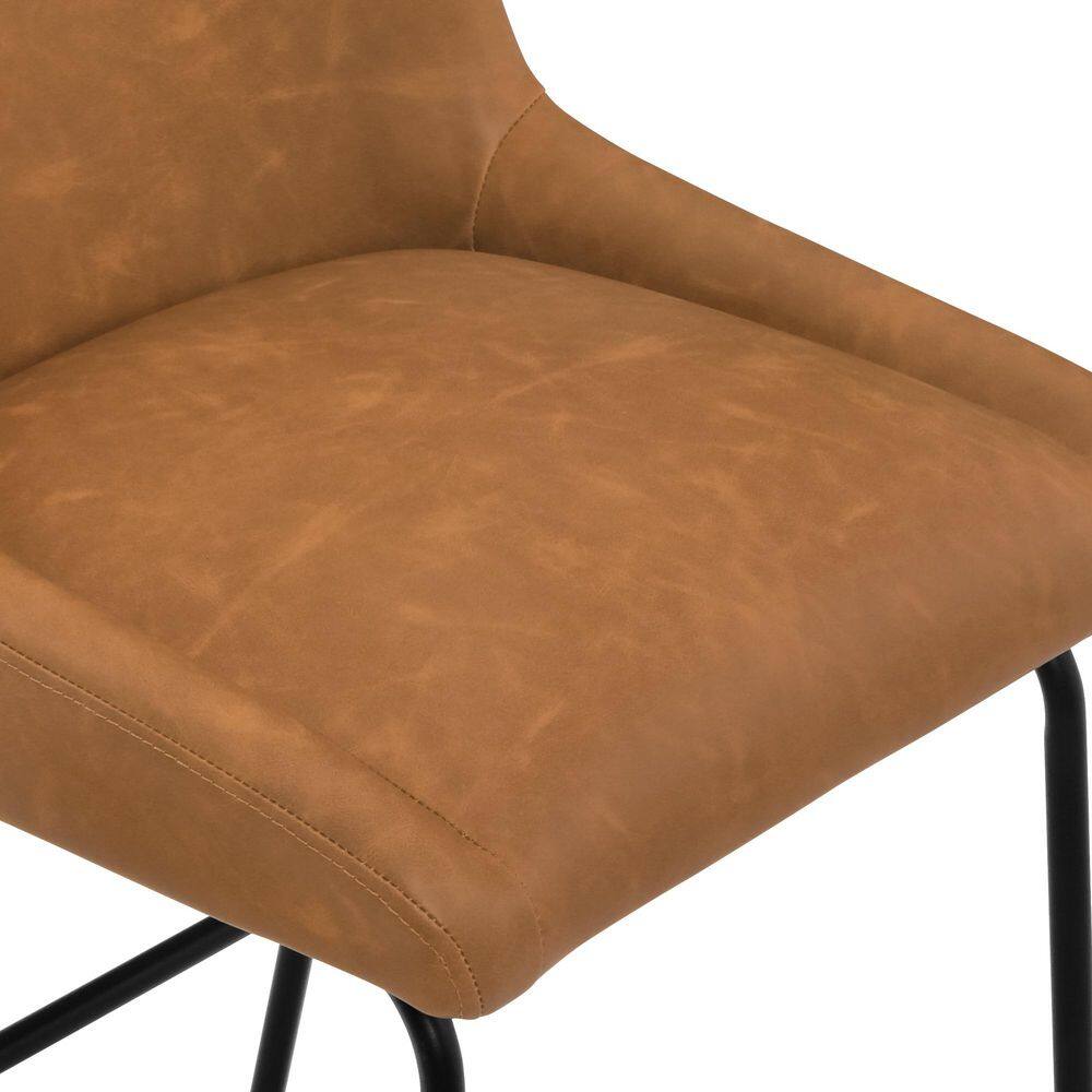 Close-up of the brown faux leather seat cushion.