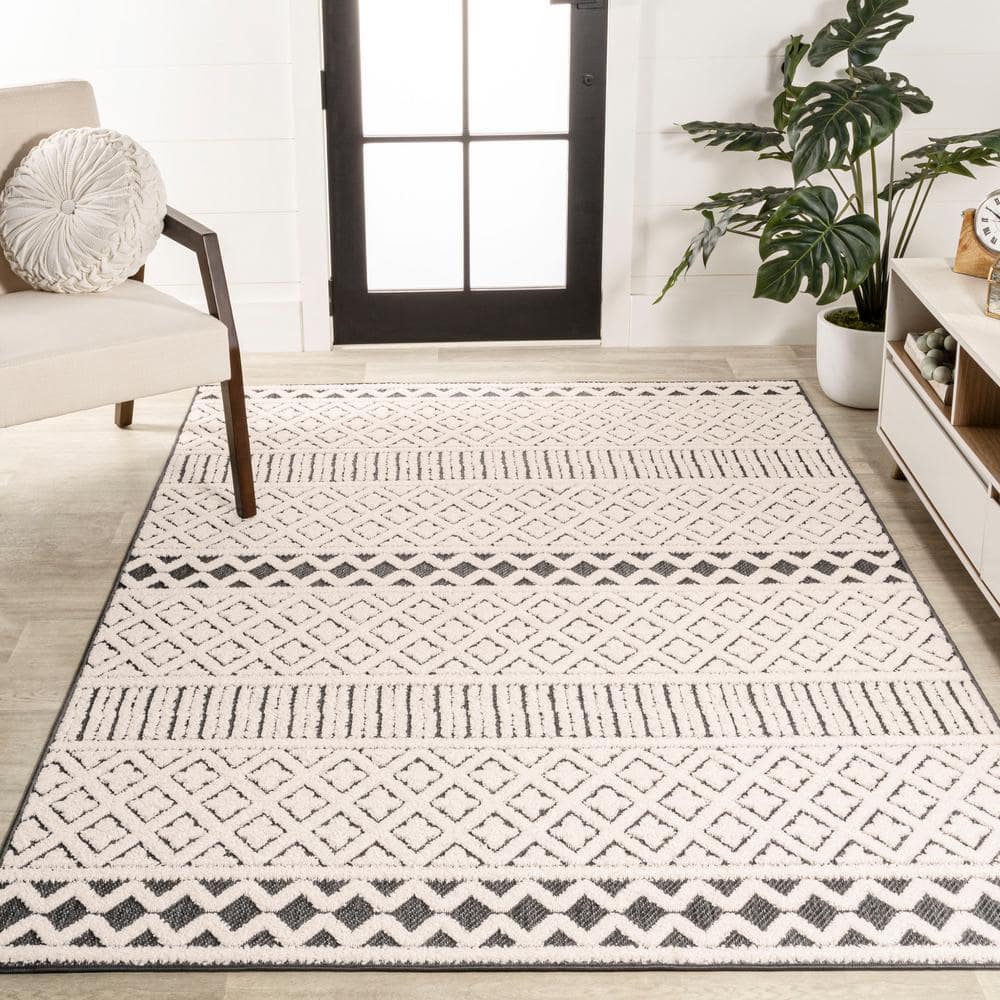 Cream and Black Geometric Synthetic Indoor/Outdoor Area Rug