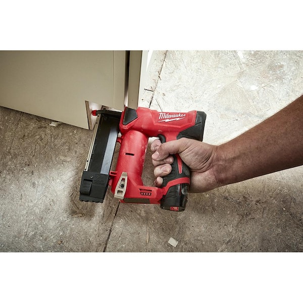 Milwaukee M12 23GA Pin Nailer with M12 FUEL Orbital Detail and M12 High Output CP2.5AH Battery