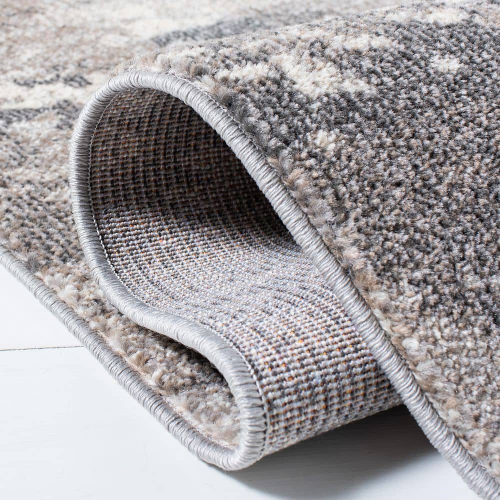 Beige and Grey Abstract 3' x 5' Synthetic Area Rug