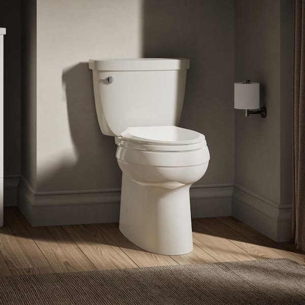 Cimarron 12 in. Rough In Elongated Chair Height Toilet Bowl Only with Skirted Trapway in Biscuit, Seat Not Included