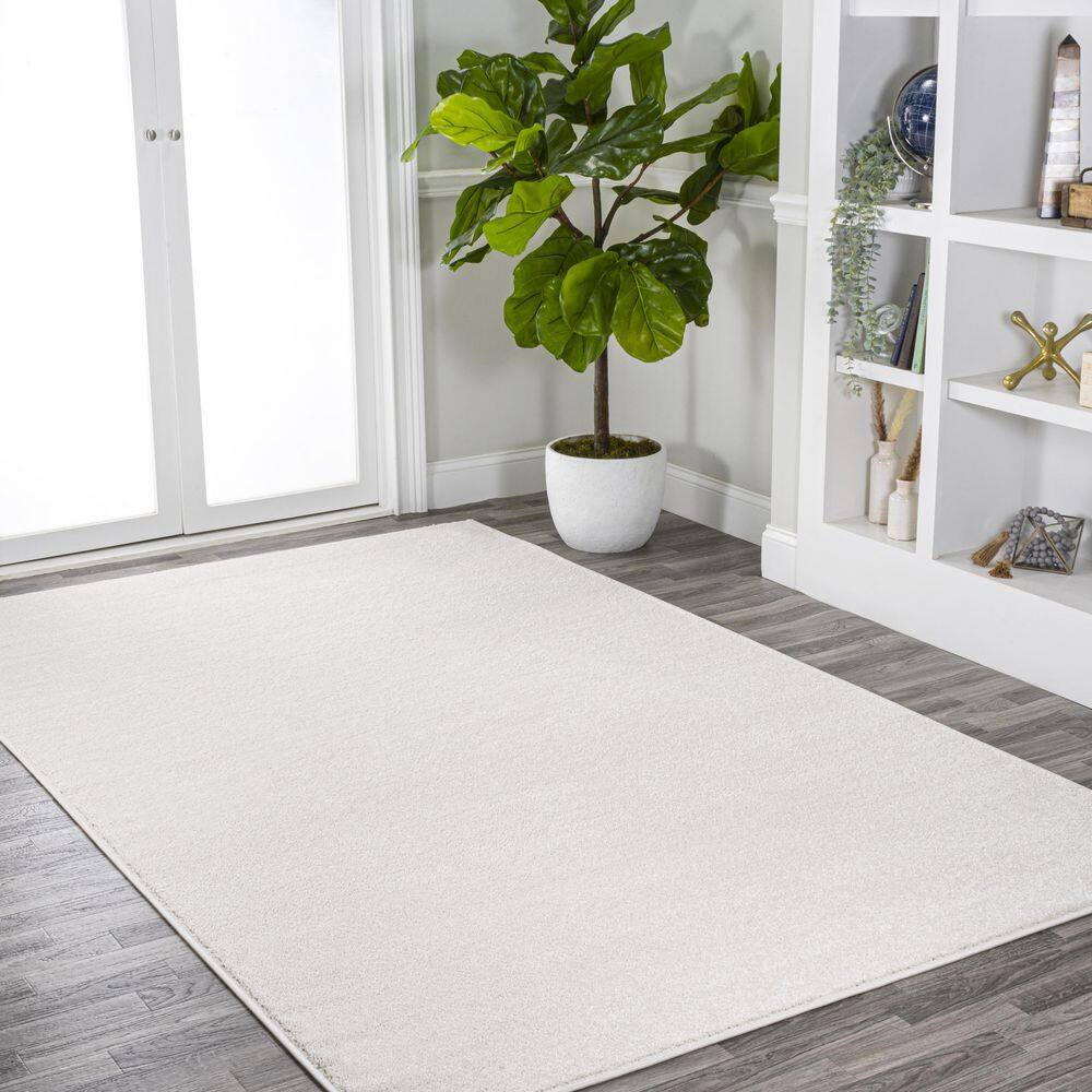 Cream Solid Synthetic Reversible 4' x 6' Area Rug