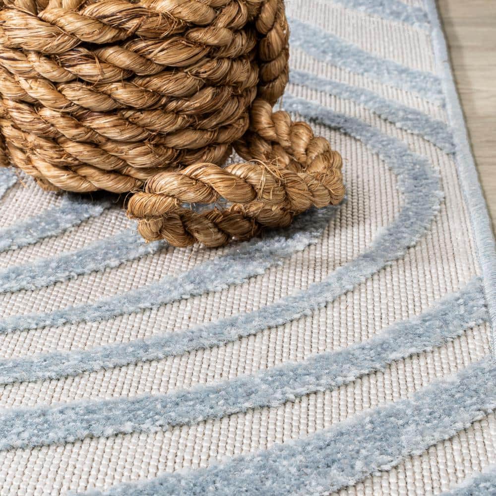 Light Blue and Ivory Abstract 4' x 6' Synthetic Area Rug
