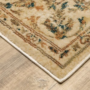 5' X 7' Beige Gold And Teal Oriental Power Loom Stain Resistant Area Rug