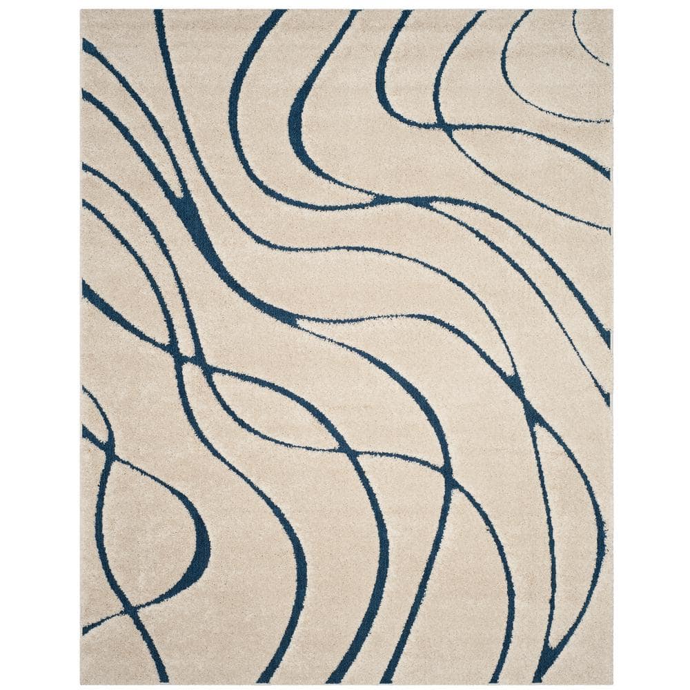 SAFAVIEH Florida Shag Cream/Blue 9 ft. x 12 ft. Solid Area Rug SG471