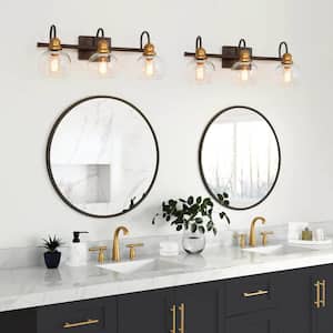 22 in. 3-Light Modern Aged Brass and Black Bathroom Vanity Light with Clear Glass Globe Shades