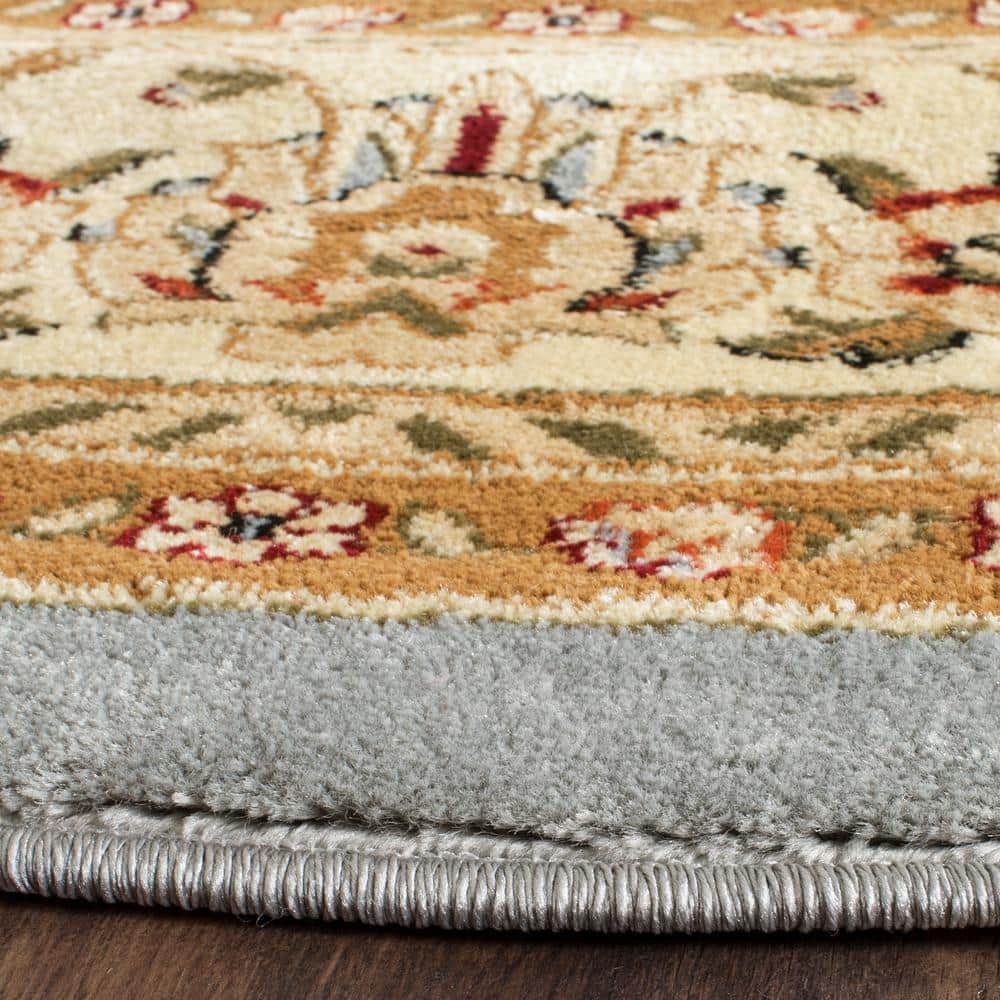 Lyndhurst Light Blue and Ivory Round Synthetic Area Rug