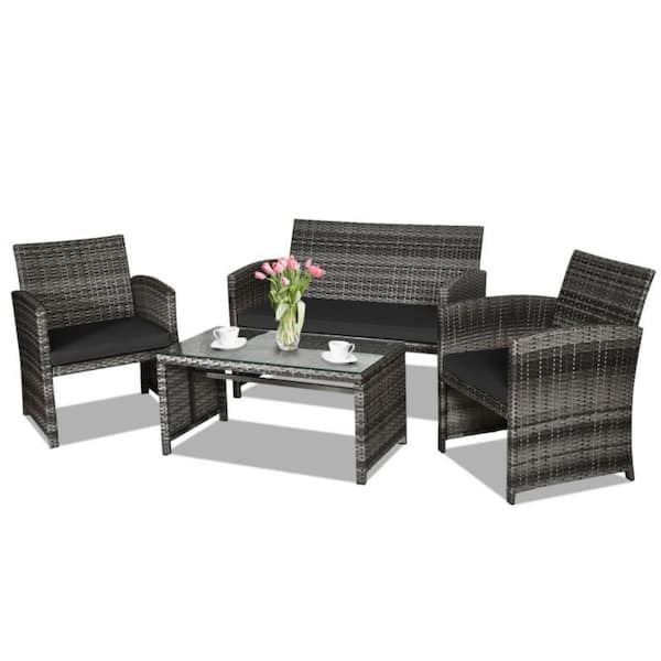 Alpulon 4-Piece Wicker Outdoor Conversation Furniture Set with Black Cushions and Tempered Glass Table