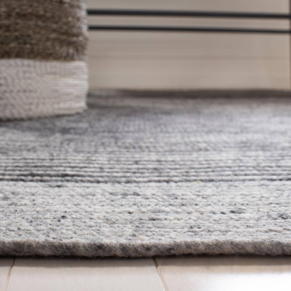 Gray and Black Oval Braided Wool Area Rug 6' x 9'