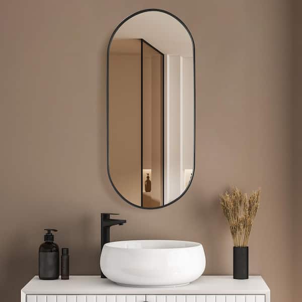 Miajadas 19.7 in. W x 45 in. H Oval Aluminum Framed Wall Bathroom Vanity Mirror in Black