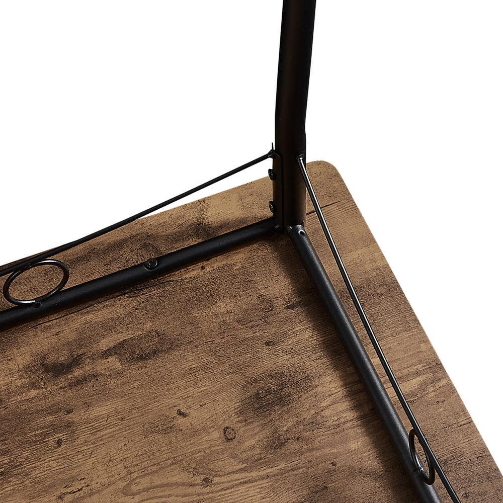 Close-up of the metal frame and wood top of the dining table.