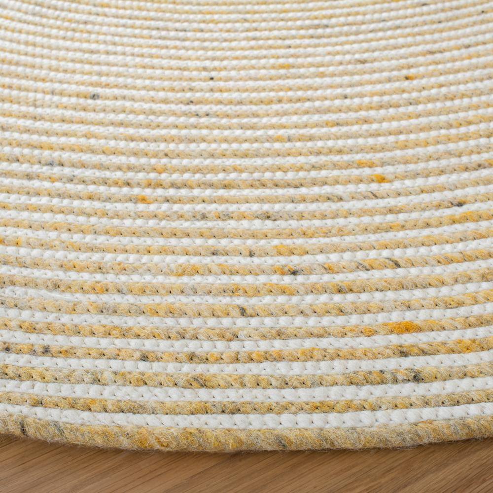 Handmade Gold and Ivory Round Wool Braided Area Rug