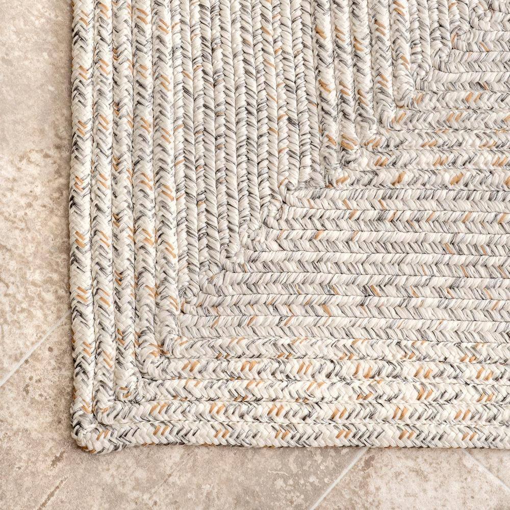 Ivory Braided Synthetic 5' x 8' Easy-Care Indoor/Outdoor Rug