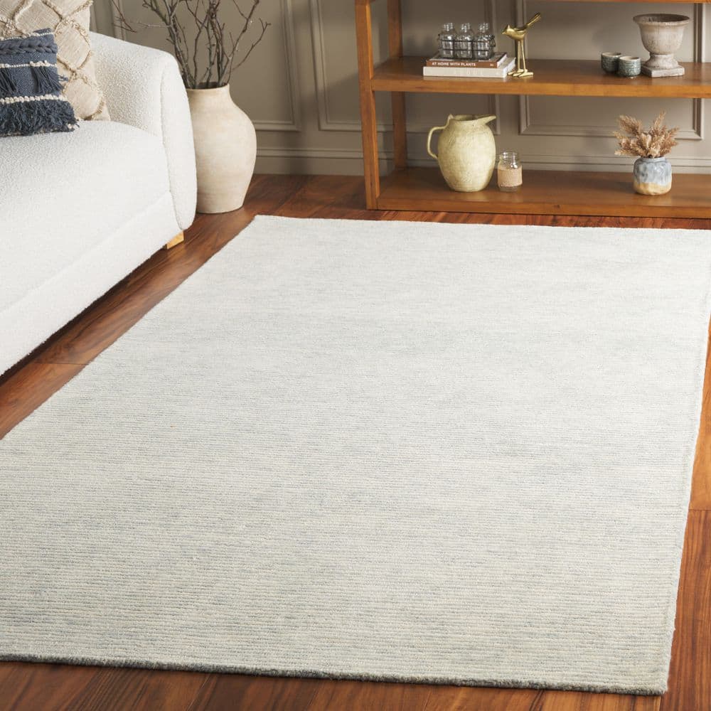 Ebony 4 ft. x 6 ft. Turquoise/Ivory Minimalist Solid Color Area Rug price history on PriceWatchPro