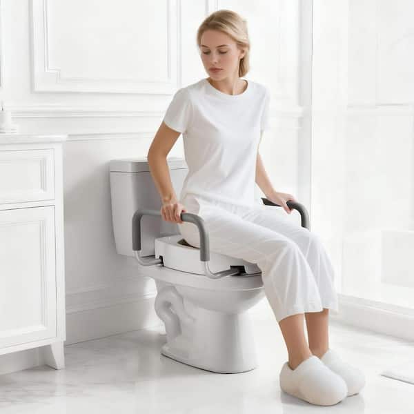 19.7 in. x 22.05 in. Elongated Toilet Seat in White, 300 lbs. Capacity, Widened Riser with Padded Handles for Seniors